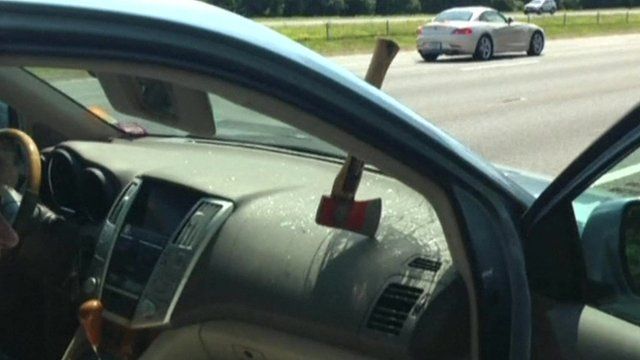 Axe through windscreen