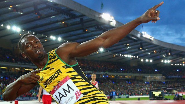 Usain Bolt celebrates a Jamaica win in the men's 4x100m relay at the 2014 Commonwealth Games
