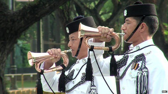 Two Singapore Army trumpeters play at tribute to start of WW1