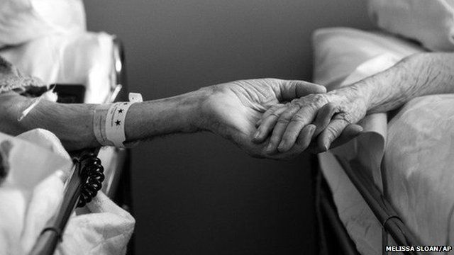 Don and Maxine Simpson hold hands