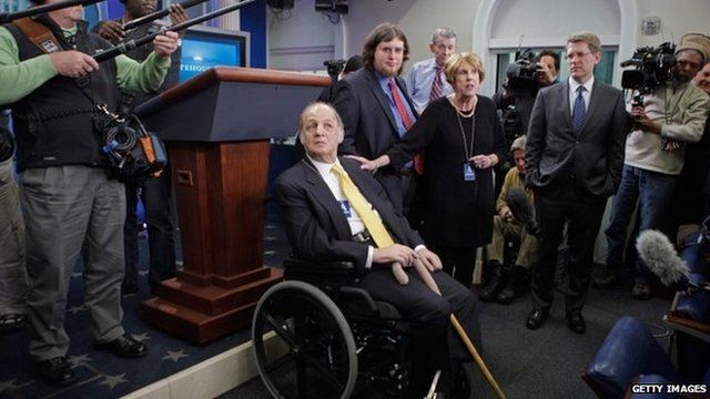 Former White House Press Secretary James Brady visit the press briefing room that bears his name in the West Wing of the White House with current Press Secretary Jay Carney (3rd R) 30 March 2011 in Washington, DC.