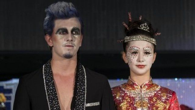 Models dressed as Chinese ghosts take part in a Funeral Fashion Show