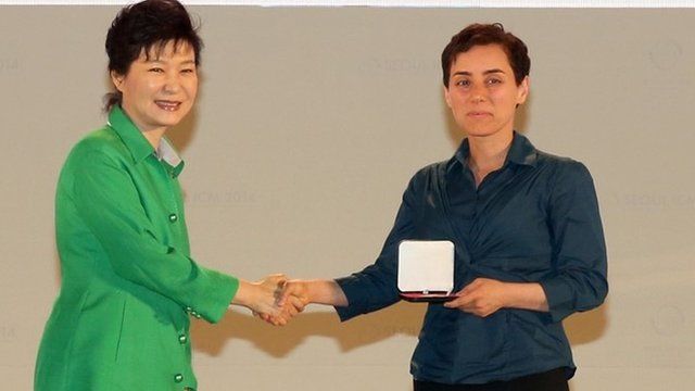 South Korean President Park Geun-Hye (L) giving the prize to Maryam Mirzakhani (R)