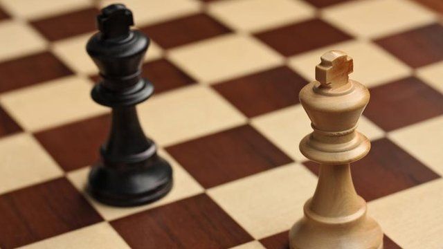 Chess pieces on a board