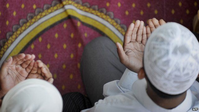 Muslim boys praying
