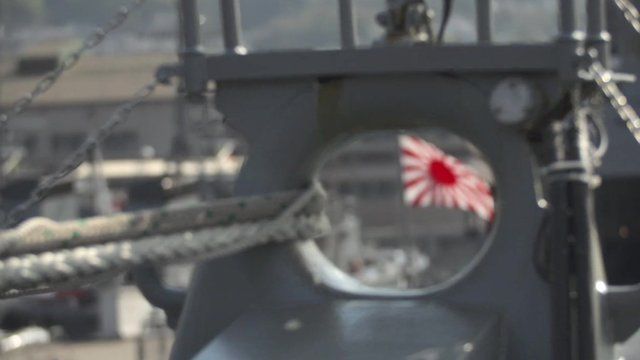 Japanese flag seen through battleship