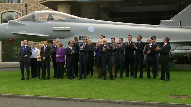 Nato leaders family photo in front of aircraft, Newport