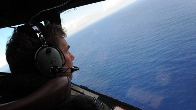 The Royal New Zealand Air Force look for objects during the search for missing Malaysia Airlines flight MH370,