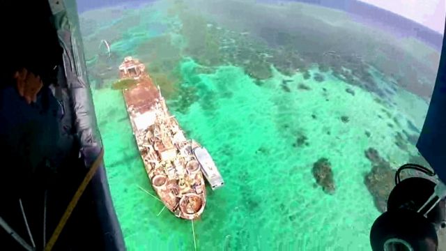 Aerial view of rusting Philippine ship, Sierra Madre