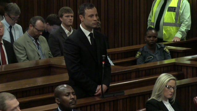 Pistorius stands in court
