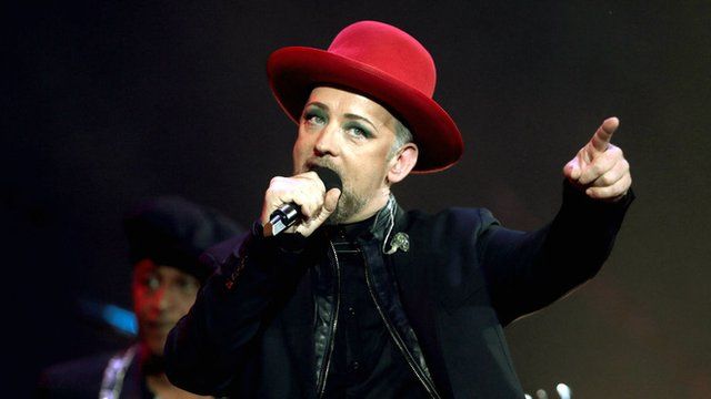 Boy George performing on stage