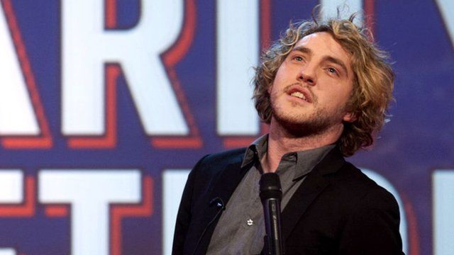 Seann Walsh performing onstage