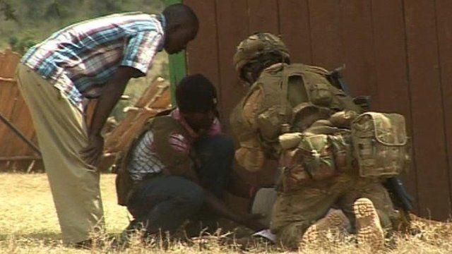 A soldier with Kenyans