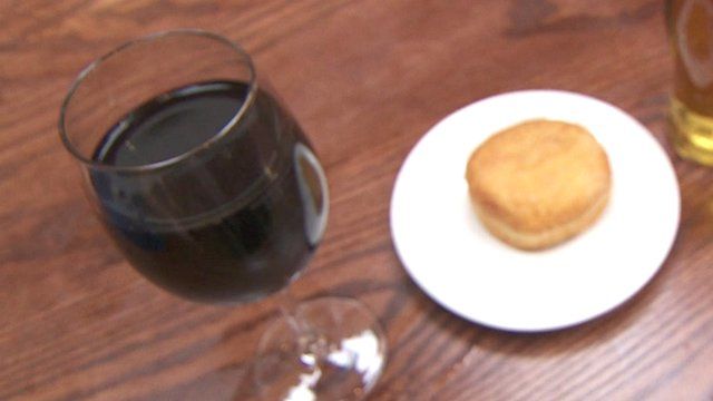 Glass of wine and a doughnut