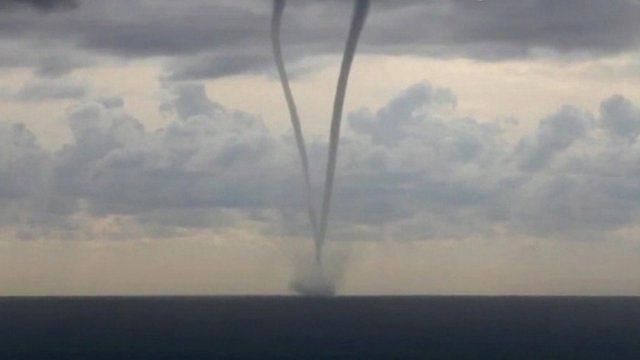 Two waterspouts of the Ligurian coast