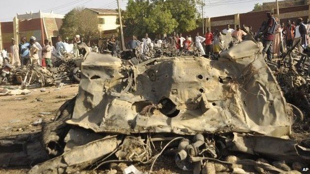 People gather at scene of bombing in Kano - 28 November