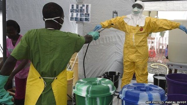 Health workers in protective clothing