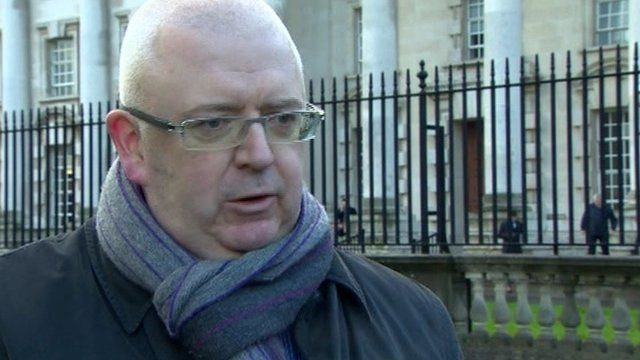 The family's solicitor, Damian Deazley, spoke on their behalf outside the High Court in Belfast.