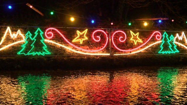 Christmas lights illuminating along Thornton le Dale's stream bank