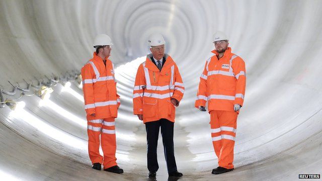 Prince Charles (middle) standing in Thames Water's Lee Tunnel, 75km under Stratford, East London
