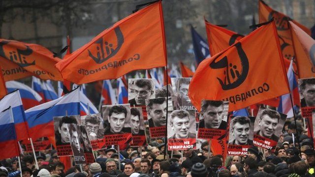 People march in memory of opposition leader Boris Nemtsov