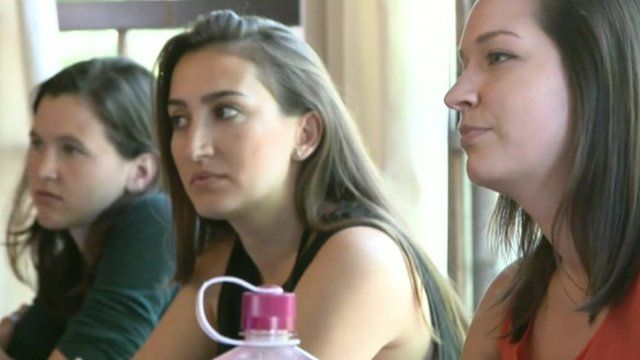 women at a conference