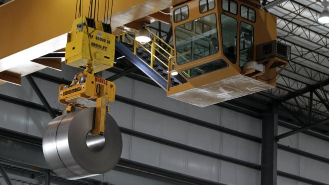 Rolled steel is hoisted by a crane after being treated on the pickle line at Severstal North America plant in Dearborn, Michigan, USA, 21 June 2012