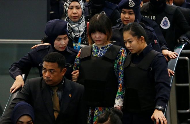 Vietnamese Doan Thi Huong, who is on trial for the killing of Kim Jong Nam, the estranged half-brother of North Korea"s leader, is escorted as she revisits the Kuala Lumpur International Airport 2 in Sepang, Malaysia 24 October 2017.