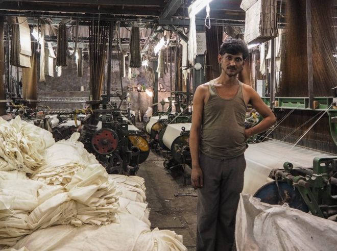 India 2015. A cotton factory worker.