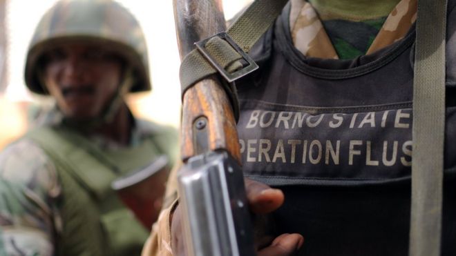 Nigerian soldiers of the "Operation Flush" stand in a military camp in Maiduguri capital of Borno state on June 6, 2013