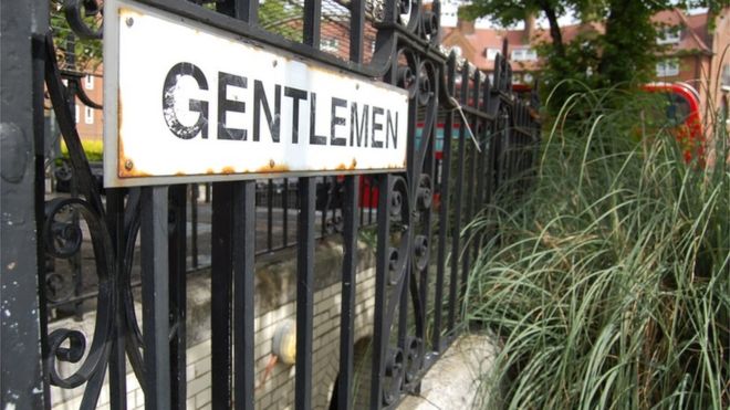 Gentlemen sign outside a public convenience at South End Green near Hampstead Heath, north London