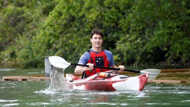 Canada's Prime Minister Justin Trudeau paddles a kayak to mark World Environment Day on the Niagara River, that borders with the United States, in Niagara-on-the-Lake, Ontario, Canada June 5, 2017.