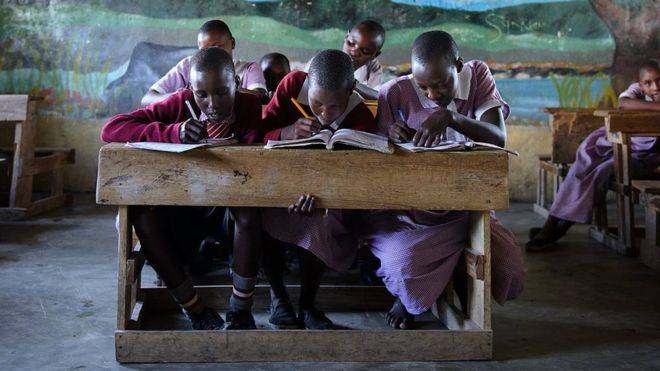 Masai children studying in a classroom of the Nkoilale primary school in Narok district in Kenya