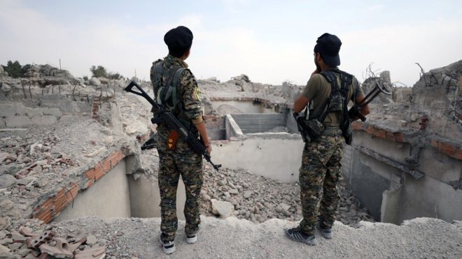 Syrian Democratic Forces (SDF) fighters in Raqqa on 16 September 2017