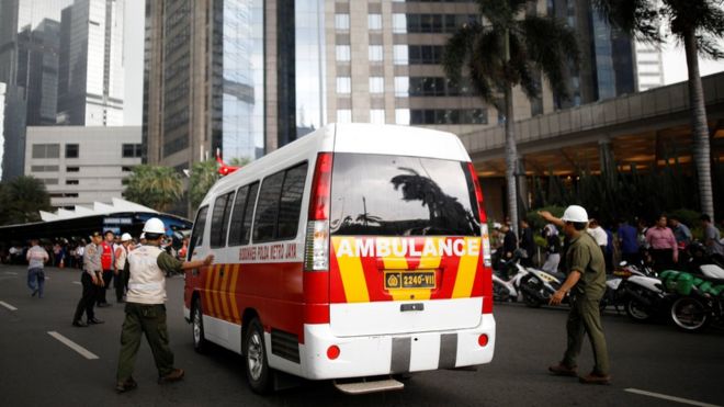 An ambulance arrives at the Indonesian Stock Exchange building following reports of a collapsed structure inside the building in Jakarta