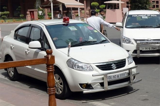 This file photo taken on May 8, 2015 shows an Indian politician"s car with a red beacon on it outside Parliament House in New Delh
