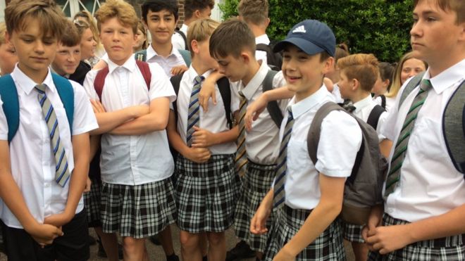 Boys kitted out in summer skirts