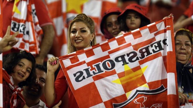 Iranian female fans cheer on Persepolis FC at the Sultan Qaboos Sports Complex in Muscat, Oman, on 22 August 2017