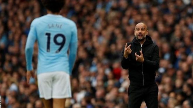 Mkufunzi Pep Guradiola na mshambuliaji wake Leroy Sane