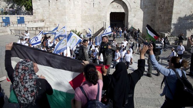 Israelis and Palestinians mark "Jerusalem Day" outside Jerusalem's Old City (file photo)