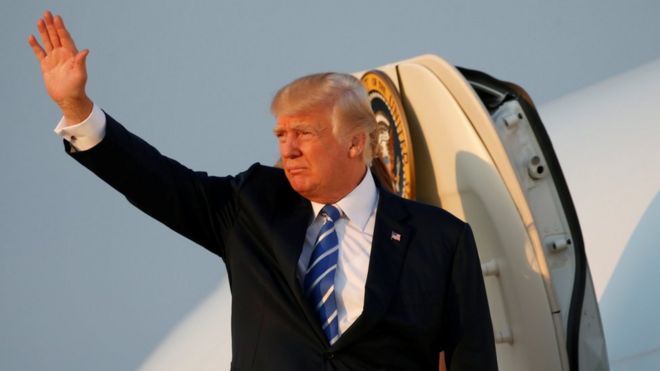 US President Donald Trump boards Air Force One in Morristown, New Jersey, U.S., on his way back to Washington August 20, 2017.