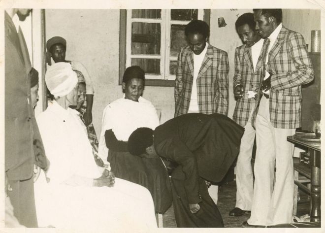 Aynalem kisses his mother’s knee before he leaves to pick up his bride