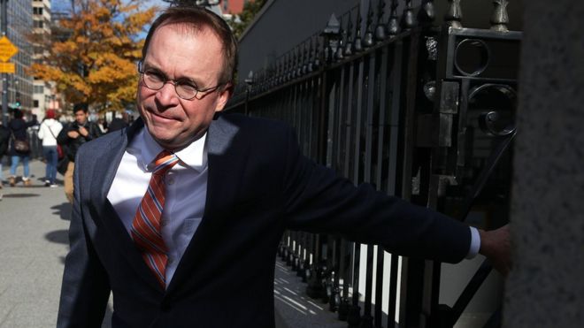 White House Budget Director Mick Mulvaney, President Donald Trumps pick for acting director of the Consumer Financial Protection Bureau, walks back to the White House from the CFPB building