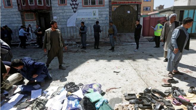 Clothes and sandals are seen at the site of a suicide bomb attack in Kabul, Afghanistan (April 22, 2018)