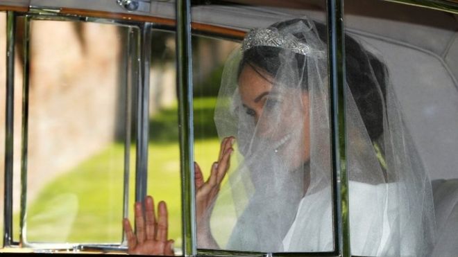Meghan markle in veil in car