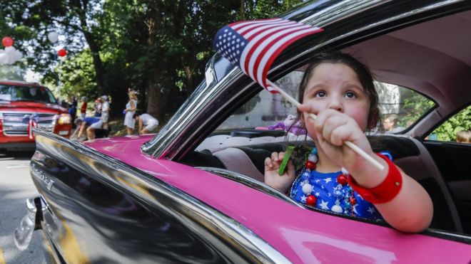 People participate in the Avondale Estates 4th of July Parade to celebrate the US Independence Day holiday in Avondale Estates, Georgia, USA, 04 July 2017