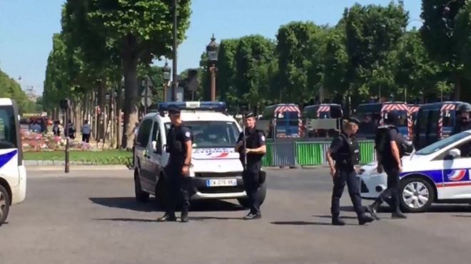 Police patrol security cordon on Champs Elysee in Paris on 19 June