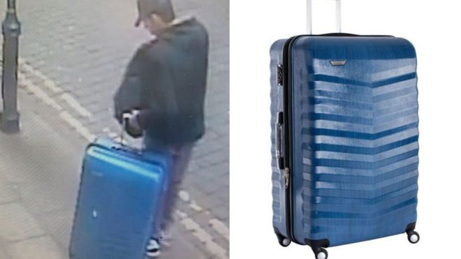 Abedi with suitcase