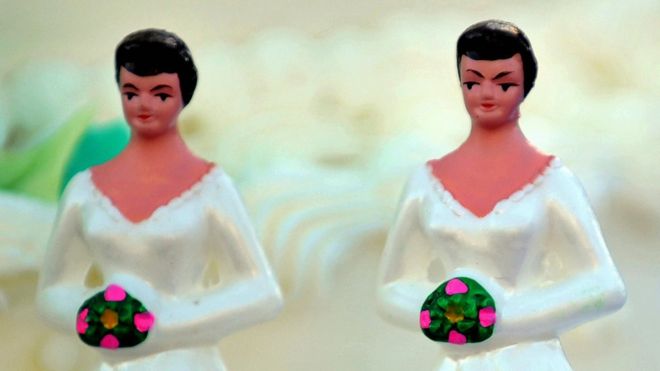 A generic photo of lesbian bride wedding toppers
