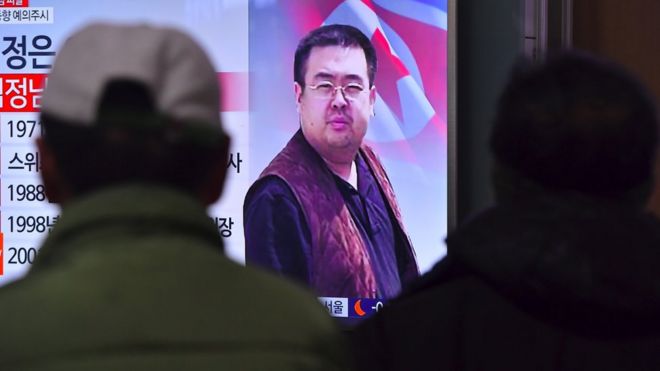 People watch a television showing news reports of Kim Jong-Nam, the half-brother of North Korean leader Kim Jong-Un, at a railway station in Seoul o